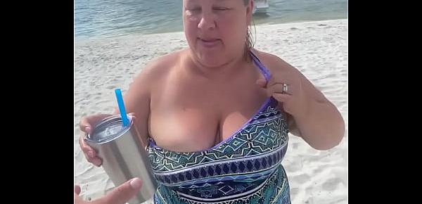  Slutty Bbw duca wife flashes her big tits on a public beach